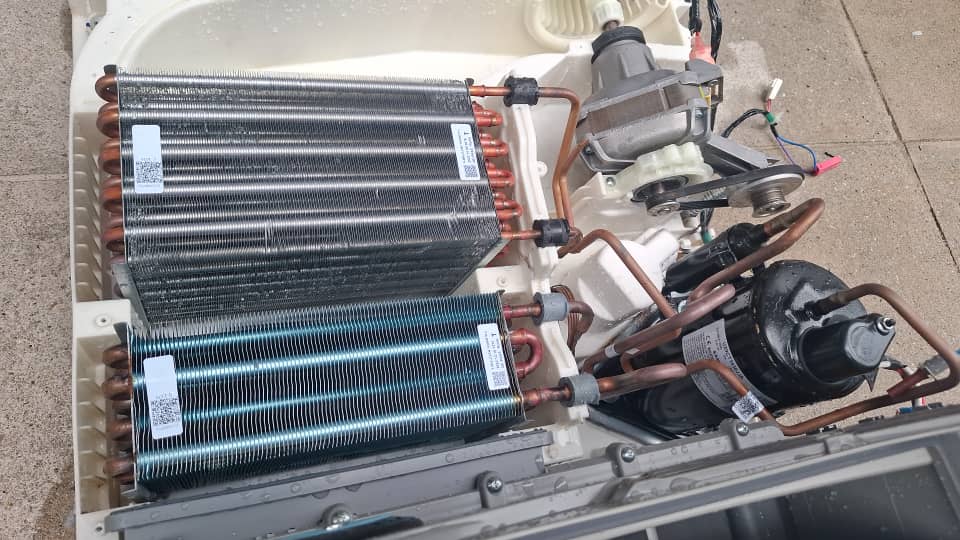 Detailed servicing of heat pump tumbling dryer compressor